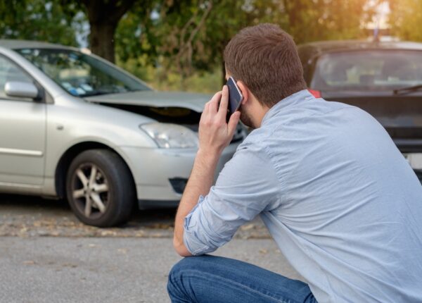a car accident victim on the phone with his attorney