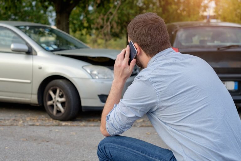 a car accident victim on the phone with his attorney