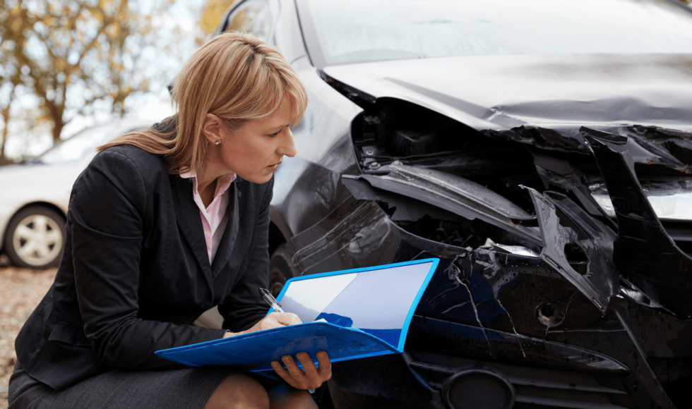 Insurance adjustor assessing a Progressive accident claim