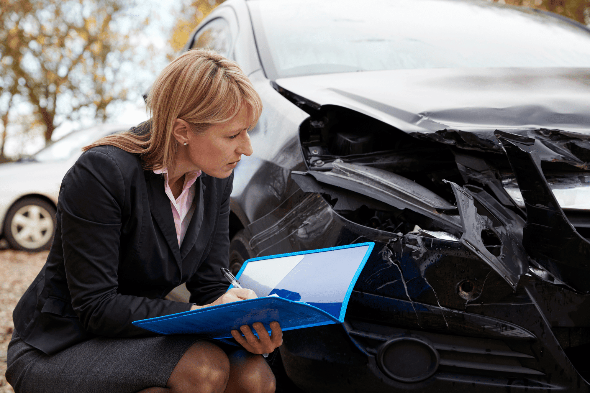 Insurance adjustor assessing a Progressive accident claim