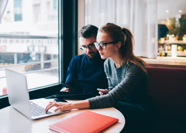 woman working with the best personal injury attorney in houston at a coffee shop