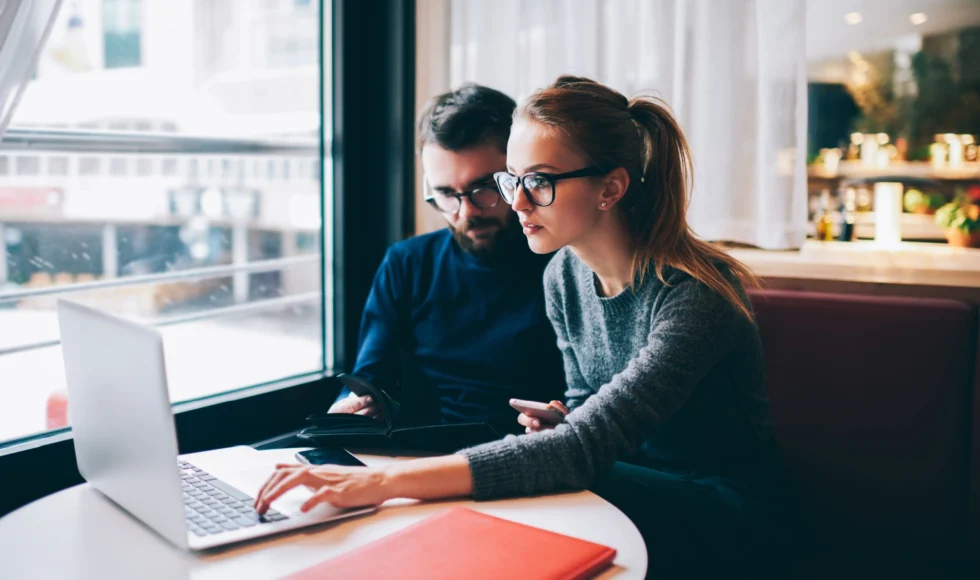 woman working with the best personal injury attorney in houston at a coffee shop