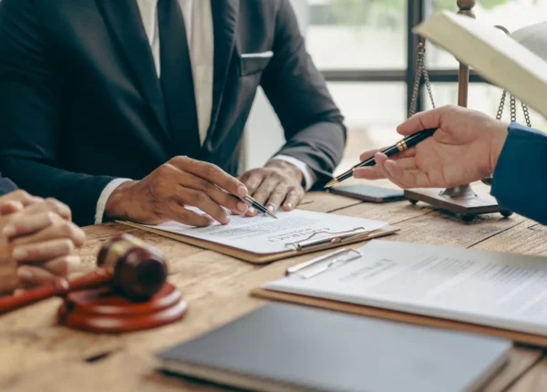 Male judge consulting, discussing an oilfield accident lawsuit